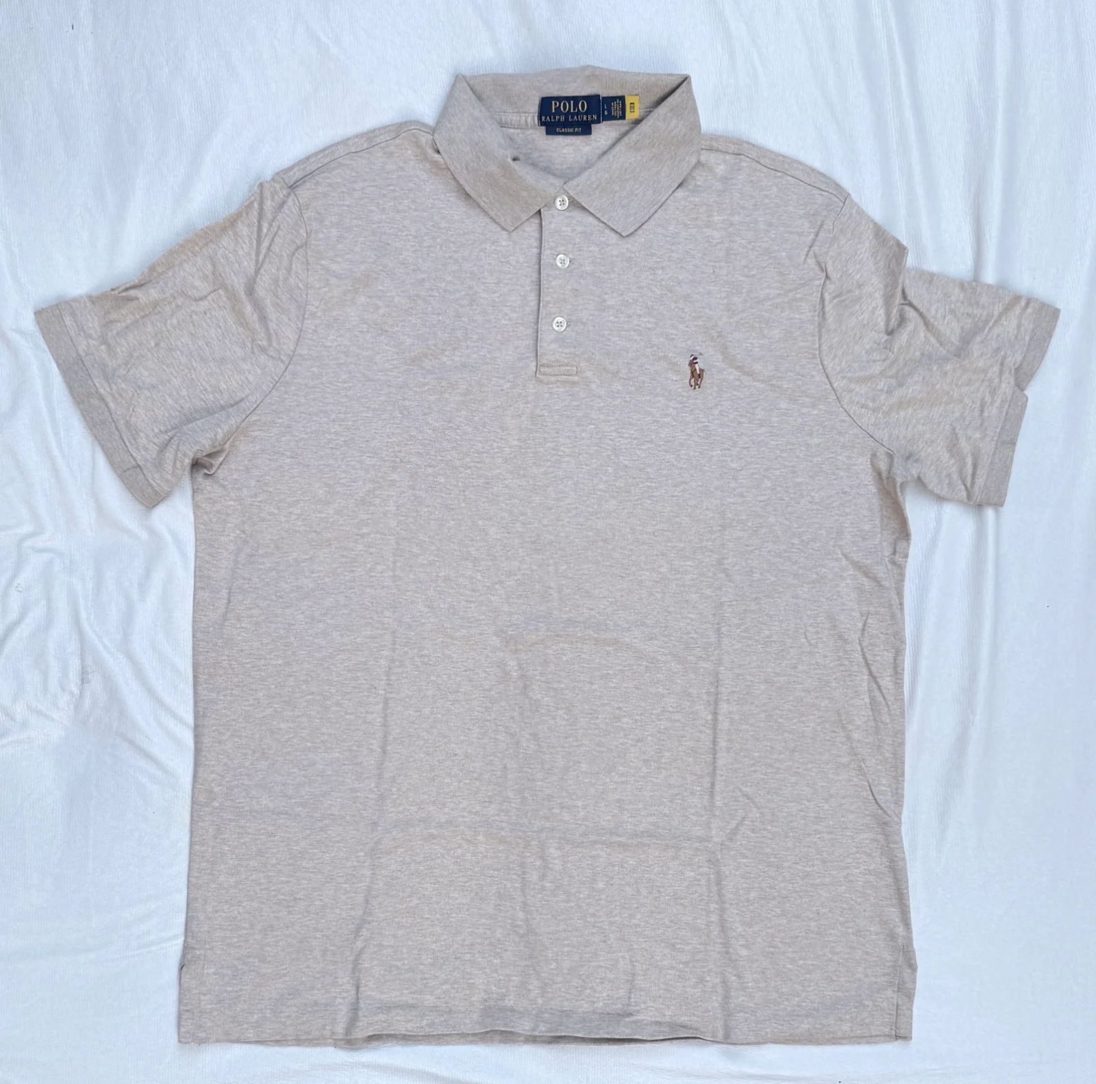 חולצת פולו שמנת · Polo Ralph Lauren