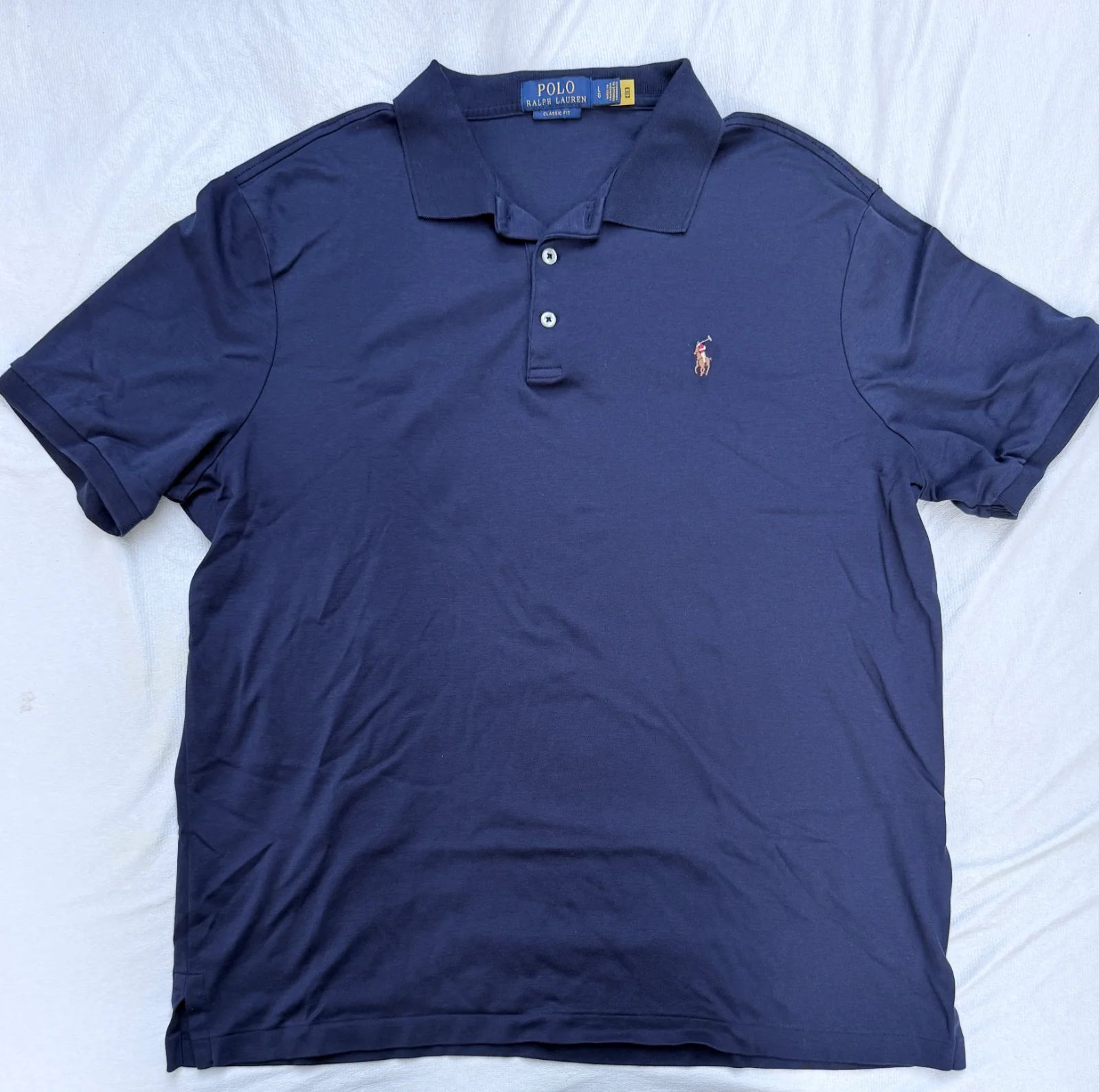 חולצת פולו כחולה · Polo Ralph Lauren