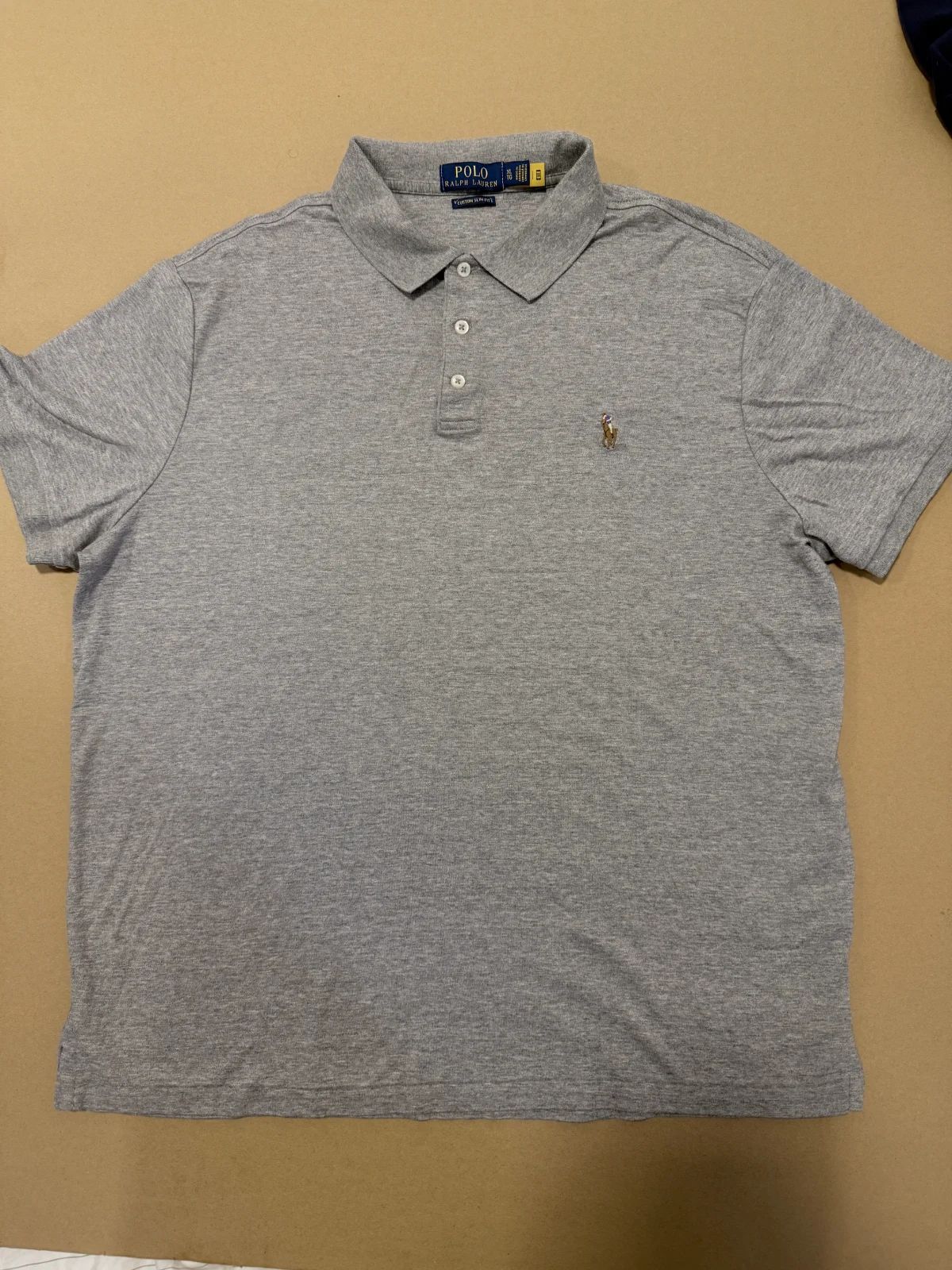 חולצת פולו אפורה · Polo Ralph Lauren