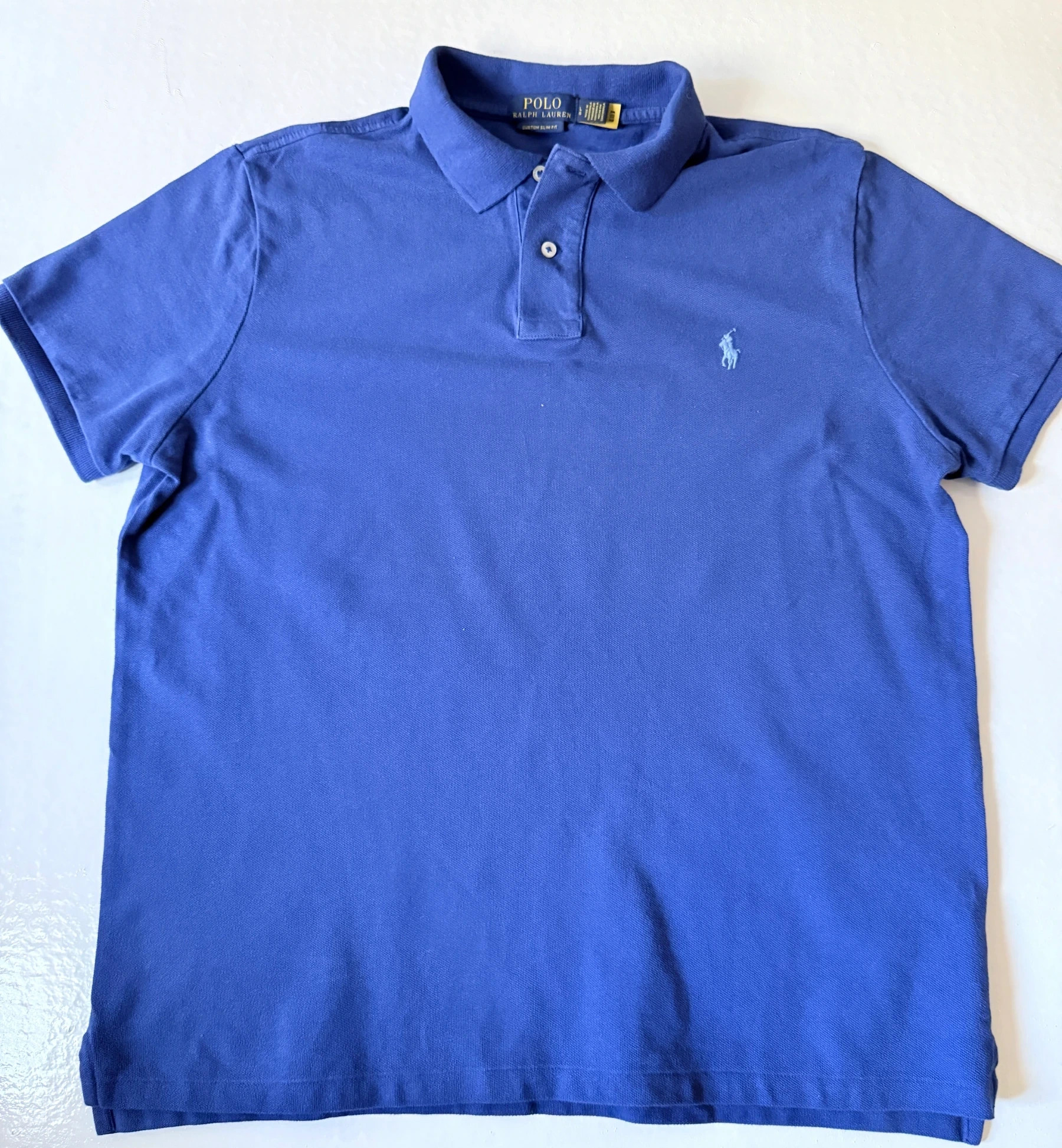 חולצת פולו כחולה · Polo Ralph Lauren