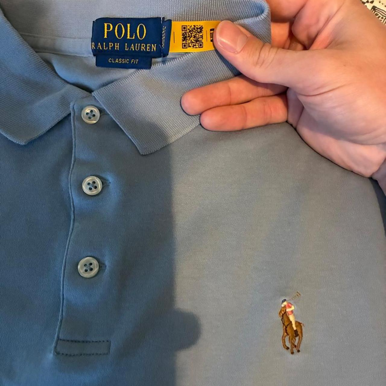 חולצת פולו כחולה · Polo Ralph Lauren